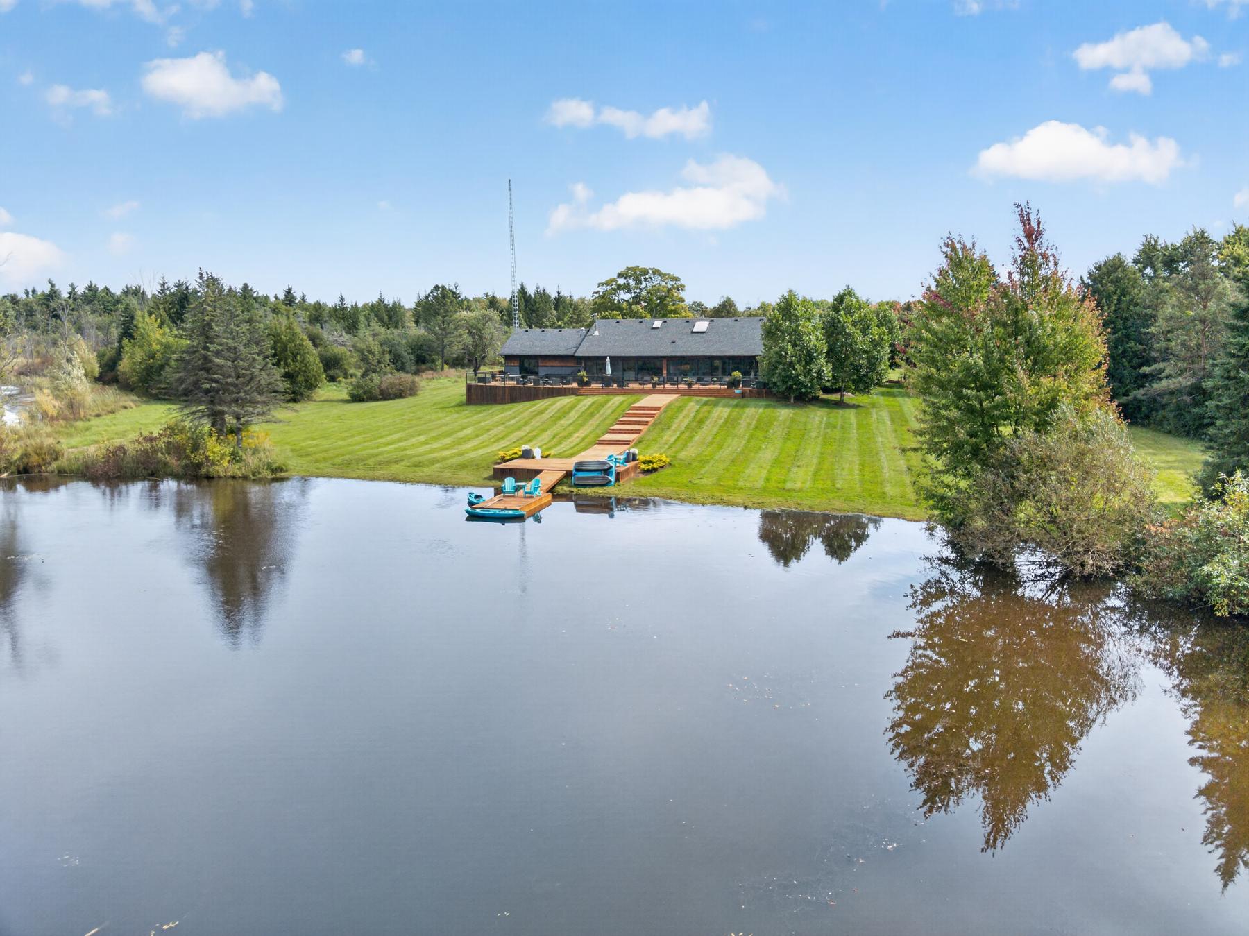 The lake, the dock and the house from over the water