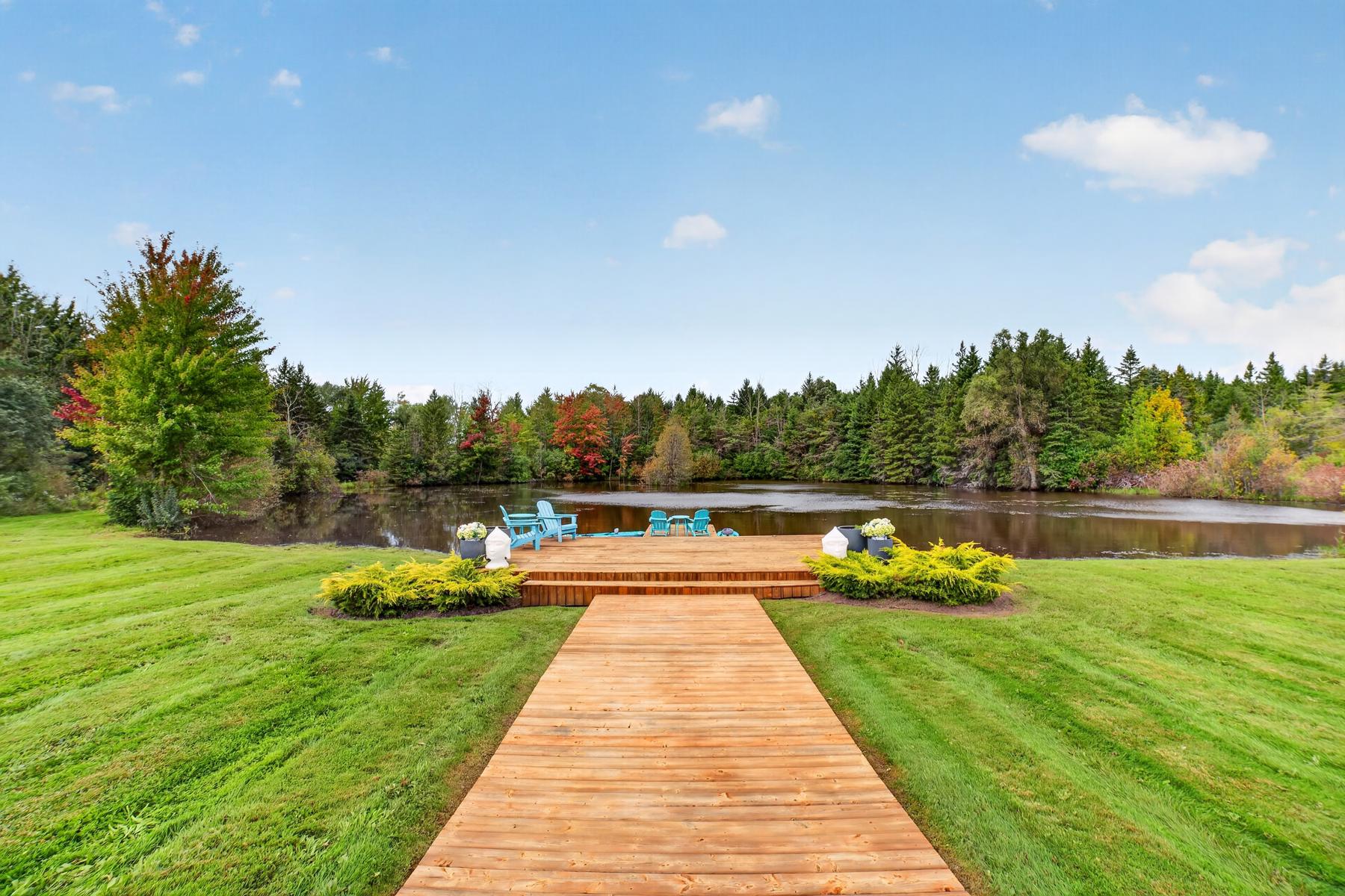 The boardwalk running from the lawn to the dock